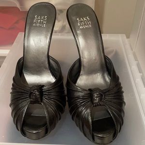 Saks Fifth Avenue peep toe black leather heels. Size 9M. Brand new.